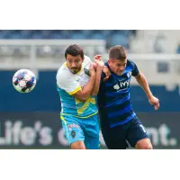 Las Vegas Lights FC's Juan Herrera-Perla (left) works for possession vs. the Swope Park Rangers