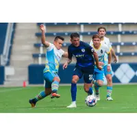 Las Vegas Lights FC's Marcelo Alatorre slides in to break up possession vs. the Swope Park Rangers