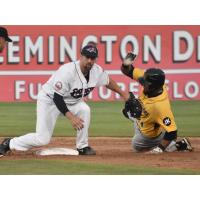 Craig Massey of the Somerset Patriots applies the tag