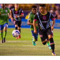 Las Vegas Lights FC defender Marcelo Alatorre works for a clearance