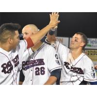 Mike Fransoso of the Somerset Patriots receives congratulations after walk-off hit