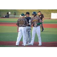 Normal CornBelters exchange fist bumps