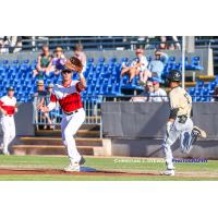 Victoria HarbourCats first baseman Cade Brown awaits a throw
