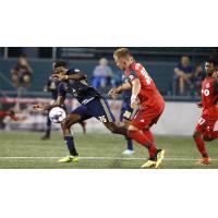 Bethlehem Steel FC forward Faris Pemi Moumbagna (left) vs. Toronto FC II