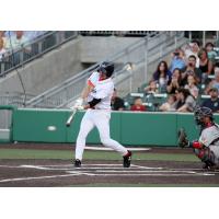 Rafael Palmeiro batting with the Cleburne Railroaders