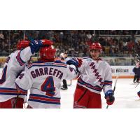 Kitchener Rangers celebrate a goal in the season opener