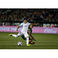Seattle Sounders FC battle the Portland Timbers