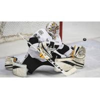 Goaltender Mikhail Denisov makes a save with the Blainville-Boisbriand Armada