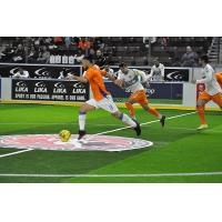Mississauga MetroStars' Mo Babouli in action against the Florida Tropics