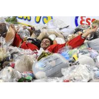 Calgary Hitmen forward Kaden Elder in a pile of bears