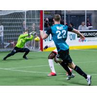 St. Louis Ambush forward Zach Reget races to the ball