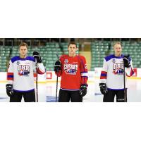 Kelowna Rockets defencemen Lassi Thomson and Kaedan Korczak and forward Nolan Foote