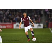 Defender Marc Burch with possession for the Colorado Rapids