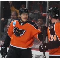 Lehigh Valley Phantoms exchange congratulations after a goal