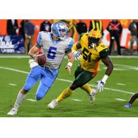 Salt Lake Stallions quarterback Josh Woodrum Evades the Arizona Hotshots' pass rush