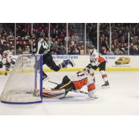 Utah Grizzlies forward Caleb Herbert scores against the Kansas City Mavericks