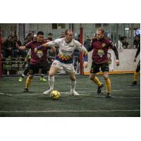Tacoma Stars forward Nick Perera possesses the ball against the Turlock Express
