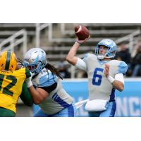 Salt Lake Stallions quarterback Josh Woodrum passes against the Arizona Hotshots