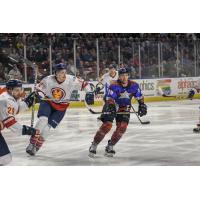 Utah Grizzlies defenseman Joey Raats (right) against the Maine Mariners