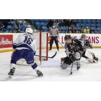 Vancouver Giants defenceman Alex Kannok Leipert (center) against the Kamloops Blazers