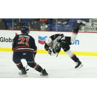 Vancouver Giants centre Justin Sourdif goes airborne against the Kamloops Blazers