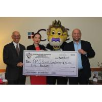 Monarchs Care presents check to CMC Breast Care Center