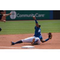 Cristian Santana makes the throw to first for the out after snagging a sharp ground ball in the Tulsa Drillers 3-2 victory over the Arkansas Travelers