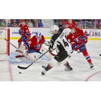 Vancouver Giants centre Milos Roman collects the puck against the Spokane Chiefs