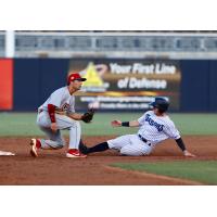 Matt Pita of the Tampa Tarpons slides into second against the Clearwater Threshers