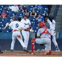 Tyler Hill, Max Burt and Oswaldo Cabrera of the Tampa Tarpons
