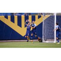 Sebastian Contreras and Jerome Kiesewetter of El Paso Locomotive FC celebrate Contreras's goal