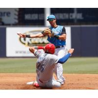 Tampa Tarpons second baseman Oswaldo Cabrera throws to first