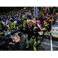 The Milwaukee Wave and Ian Bennett celebrate after clinching a championship berth