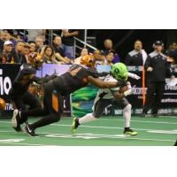 Lance McDowdell of the Arizona Rattlers makes a tackle against the Nebraska Danger