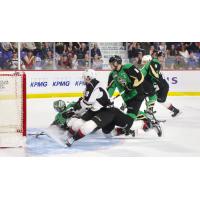 Vancouver Giants pressure Prince Albert Raiders goaltender Ian Scott