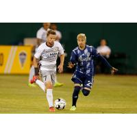 Sacramento Republic FC midfielder Hayden Partain (left) against Fresno FC