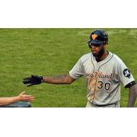 David Washington of the Long Island Ducks receives congratulations after a homer