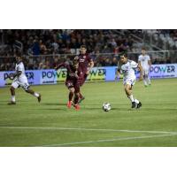 Sacramento Republic FC midfielder Ray Saari (left) races to the ball vs. Reno 1868 FC