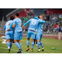 El Paso Locomotive FC celebrates a goal against New Mexico United