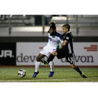 OKC Energy FC forward Omar Gordon (left)