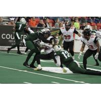 Green Bay Blizzard make a tackle against the Bismarck Bucks