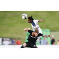 OKC Energy FC defender Mekeil Williams (top)