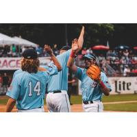St. Cloud Rox exchange high fives after a win