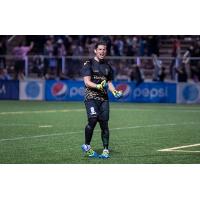 Forward Madison FC goalkeeper Ryan Coulter