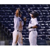 Oswaldo Cabrera and Isiah Gilliam of the Tampa Tarpons