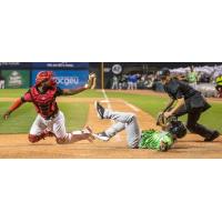 Vancouver Canadians catcher Jesus Lopez tags out a Eugene Emeralds player