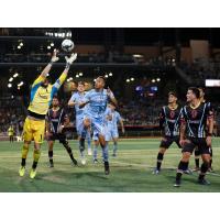 Las Vegas Lights FC goalkeeper Thomas Olsen corrals the ball against El Paso Locomotive FC