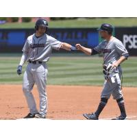 Dario Pizzano of the Somerset Patriots receives a fist bump