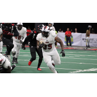 Jacksonville Sharks gain yards against the Orlando Predators