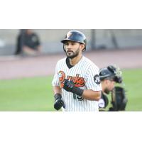 Rey Fuentes rounds the bases following his home run